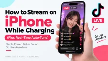 Hand holding an iPhone streaming TikTok Live while plugged in to charge